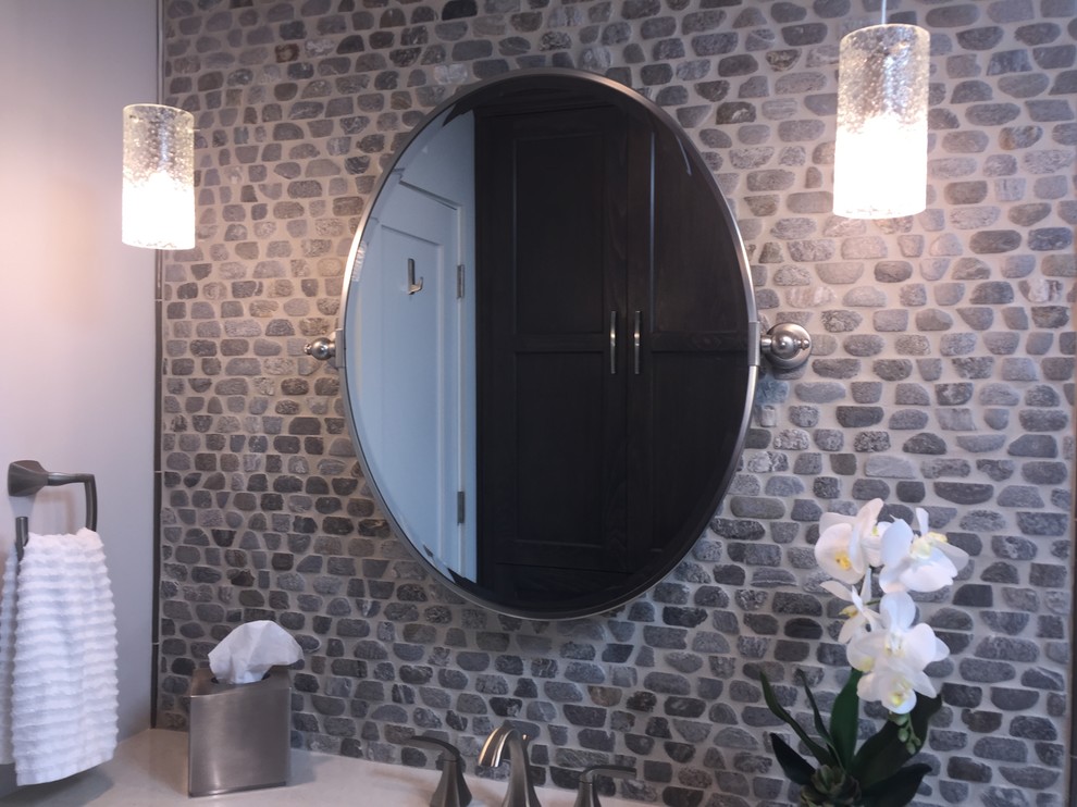 Example of a mid-sized transitional kids' gray tile and pebble tile pebble tile floor alcove bathtub design in Phoenix with an undermount sink, shaker cabinets, dark wood cabinets, quartz countertops and blue walls