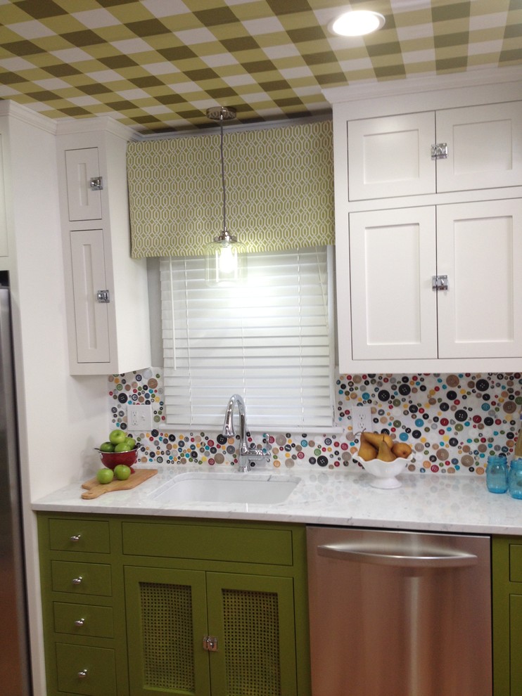 This is an example of a small country separate kitchen in Minneapolis with an undermount sink, shaker cabinets, green cabinets, marble benchtops, multi-coloured splashback, medium hardwood floors and a peninsula.
