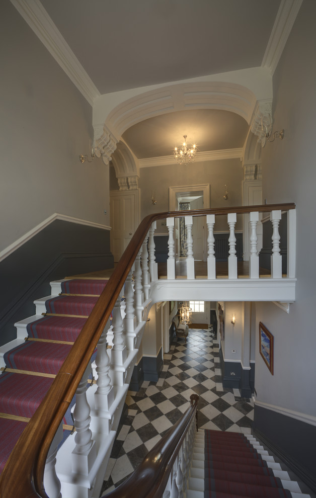 Large traditional staircase in Other.