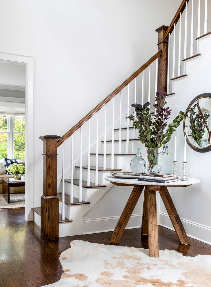 Design ideas for a transitional entryway in Boston.