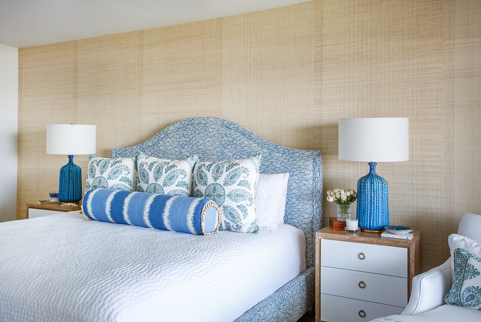 Mid-sized beach style master bedroom in Jacksonville with beige walls.