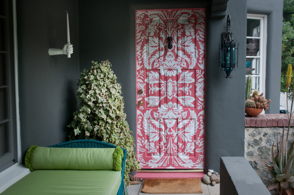 Inspiration for an eclectic front door in Orange County with a single front door.