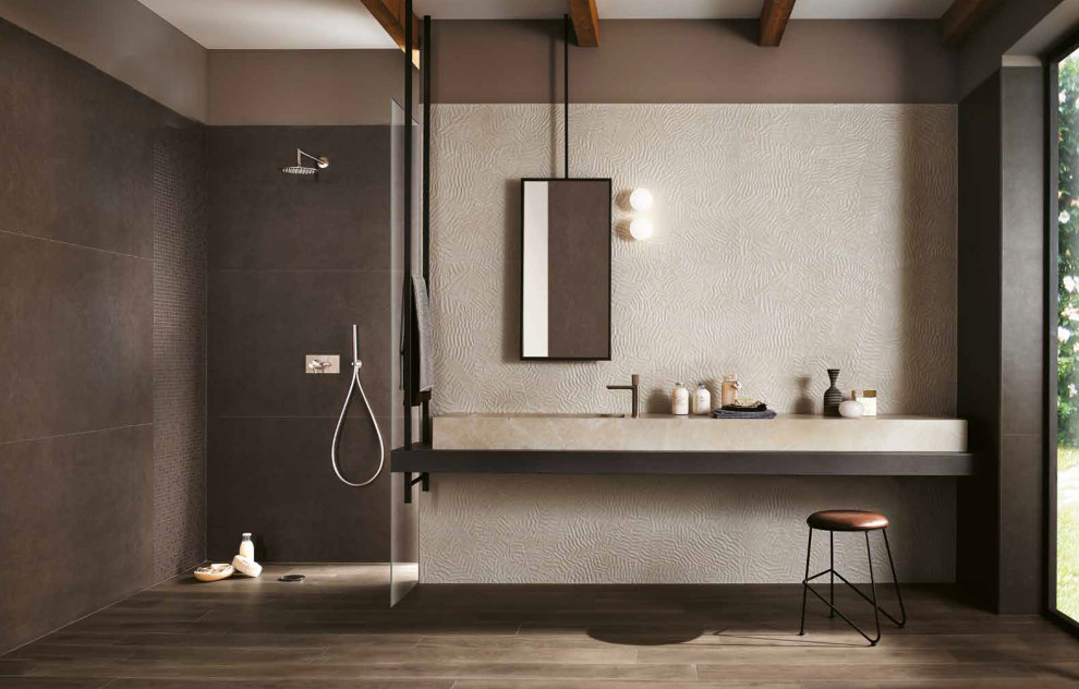 This is an example of a large modern master bathroom in Miami with beige cabinets, a curbless shower, brown tile, porcelain tile, brown walls, porcelain floors, beige floor and beige benchtops.