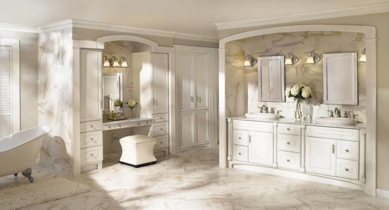 Photo of an expansive traditional master bathroom in Cleveland with a drop-in sink, beaded inset cabinets, white cabinets, marble benchtops, a claw-foot tub, white tile, white walls and marble floors.