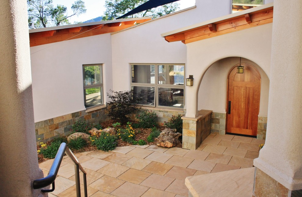 Transitional home design photo in Denver