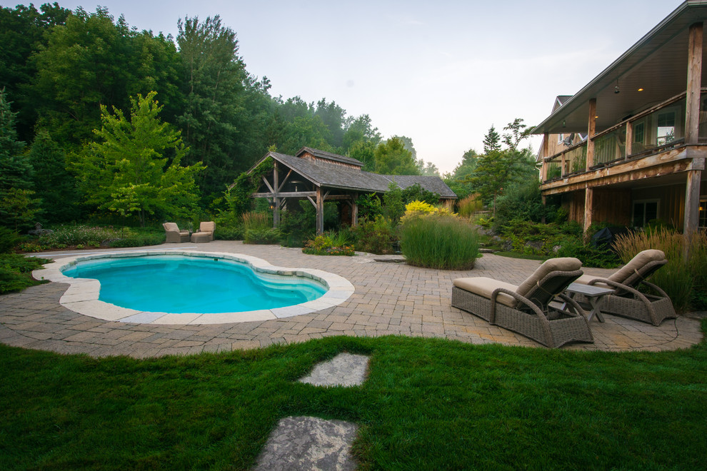 Example of a mountain style pool design in Toronto