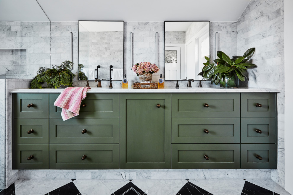 This is an example of a transitional bathroom in Sydney with shaker cabinets, green cabinets and marble benchtops.
