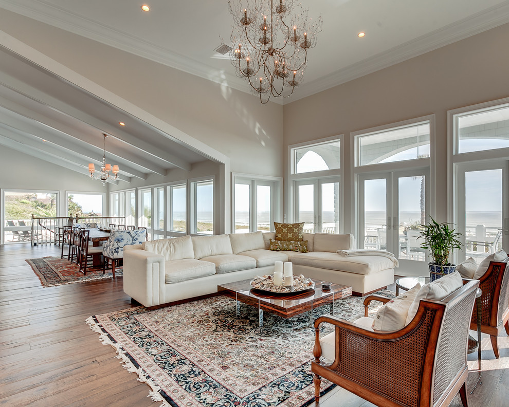 Inspiration for an expansive transitional formal open concept living room in Jacksonville with light hardwood floors and no tv.