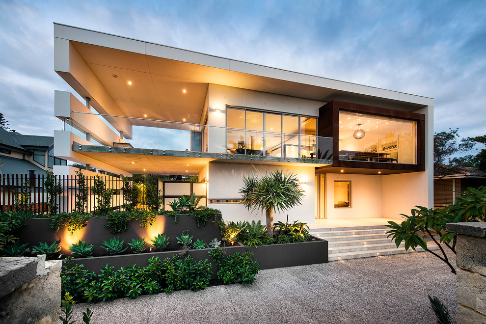 Contemporary two-storey white exterior in Perth with a flat roof.