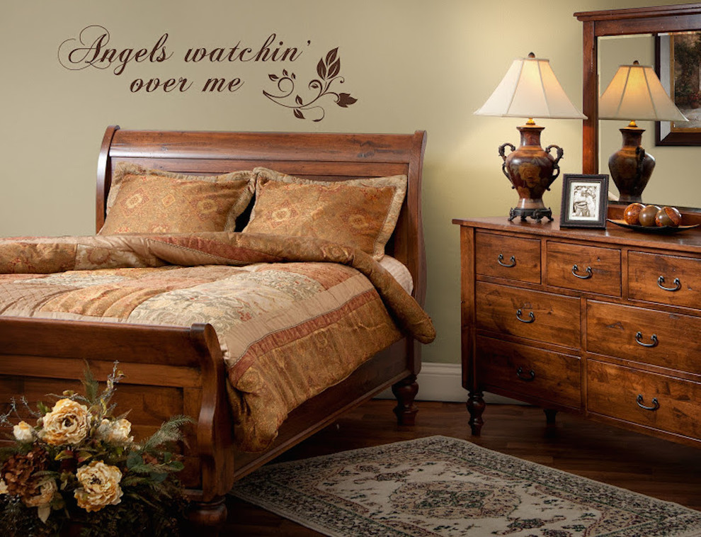 Design ideas for a mid-sized country master bedroom in Nashville with beige walls and medium hardwood floors.