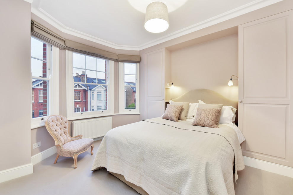 Inspiration for a transitional bedroom in London.