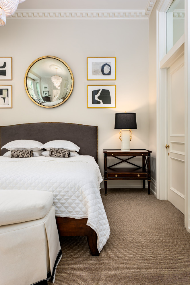 Example of a mid-sized transitional guest carpeted and beige floor bedroom design with white walls and no fireplace