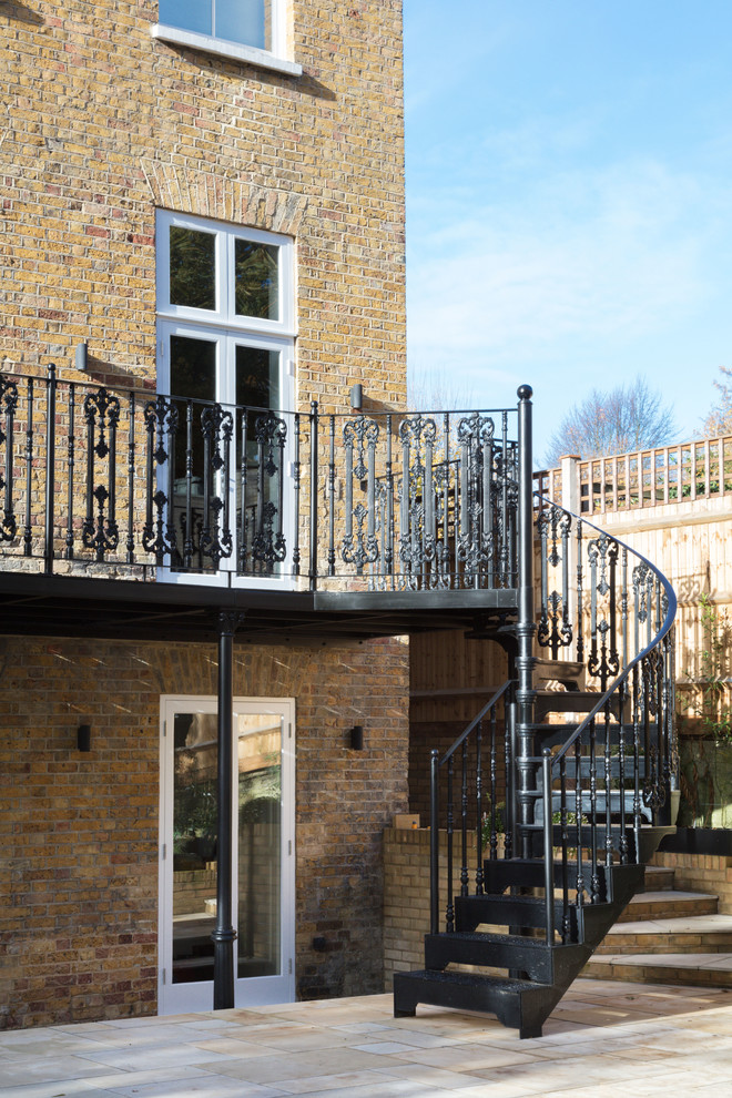 Design ideas for a medium sized traditional balcony in London.