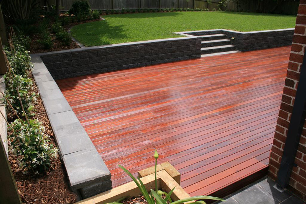 This is an example of a traditional backyard garden in Sydney with decking.