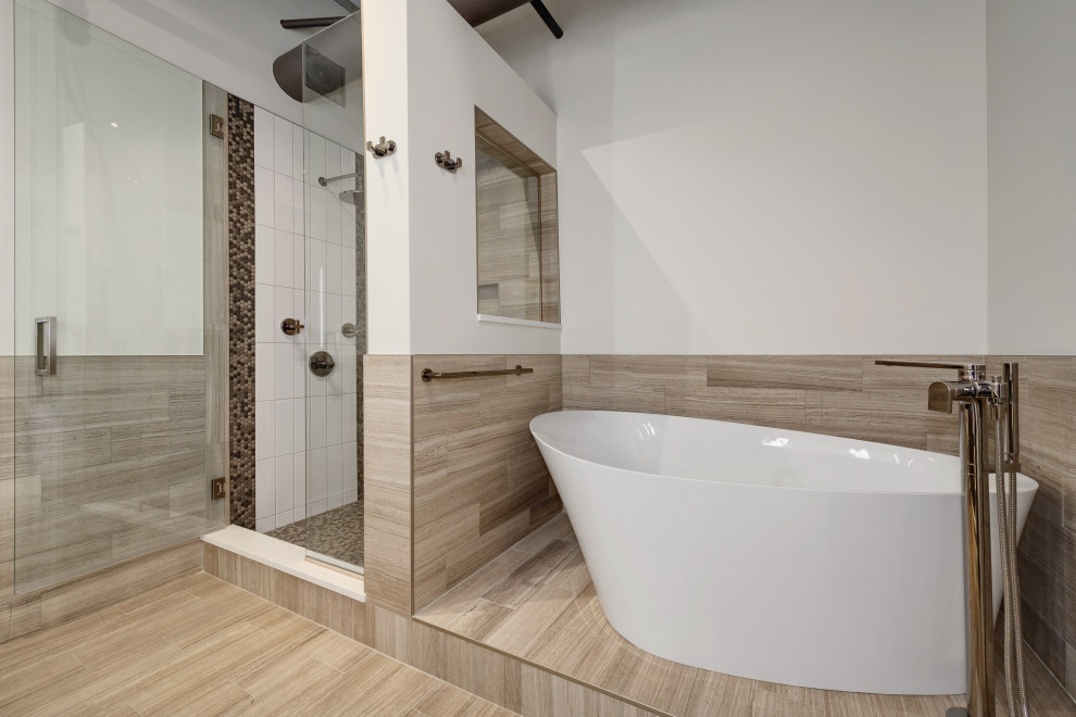 This is an example of a mid-sized transitional master bathroom in Chicago with furniture-like cabinets, grey cabinets, a freestanding tub, a corner shower, a wall-mount toilet, gray tile, marble, white walls, marble floors, an undermount sink, engineered quartz benchtops, grey floor, a hinged shower door, white benchtops, a niche, a double vanity, a floating vanity, exposed beam and planked wall panelling.