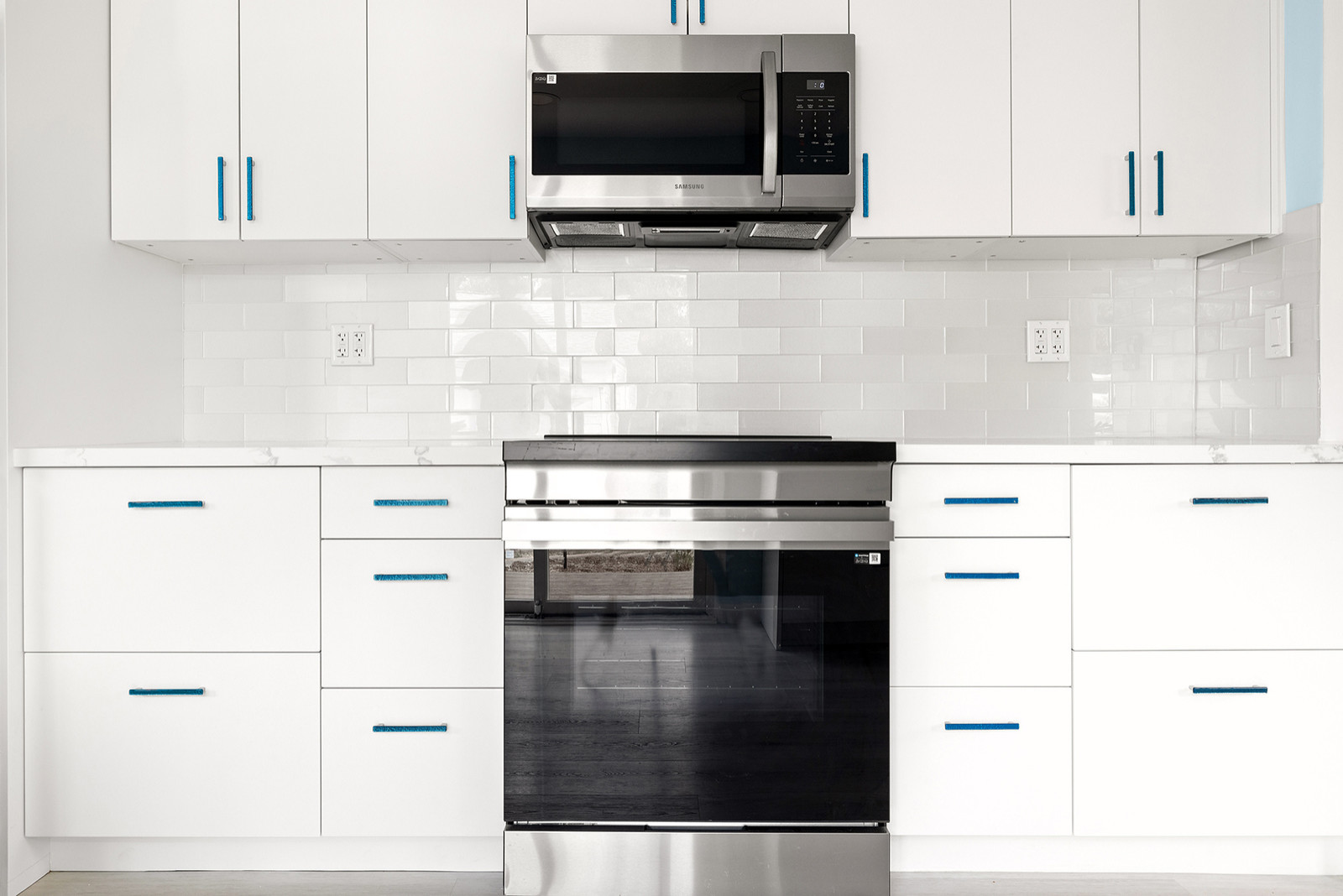 Cabinetry, Tile Backsplash, and Appliances