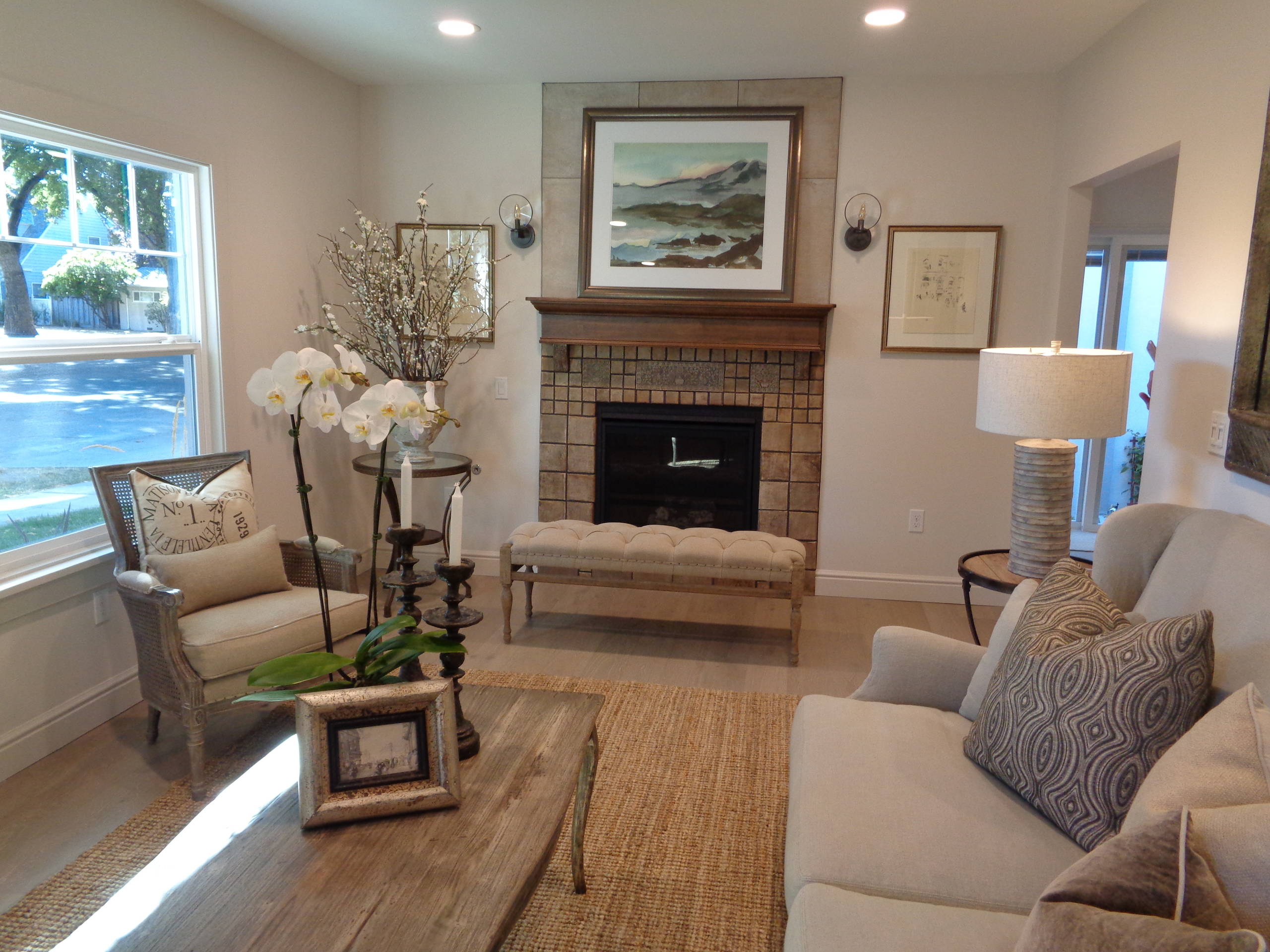 Cozy living room with original Batchelder fireplace tile