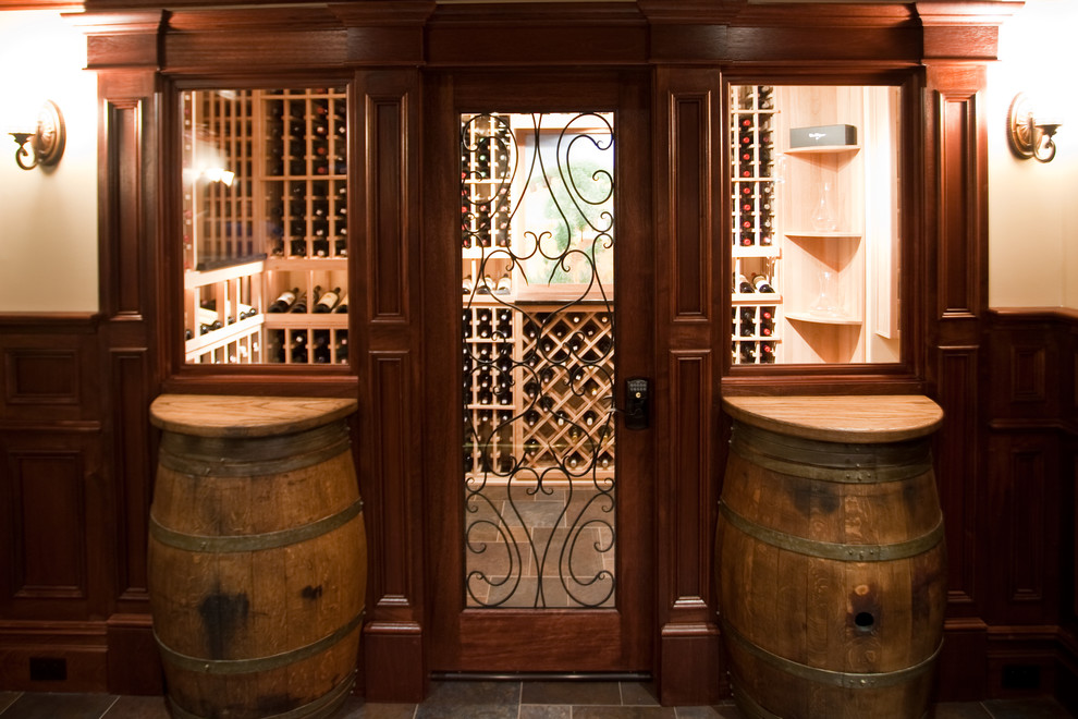 Design ideas for a mid-sized eclectic wine cellar in New York with display racks.
