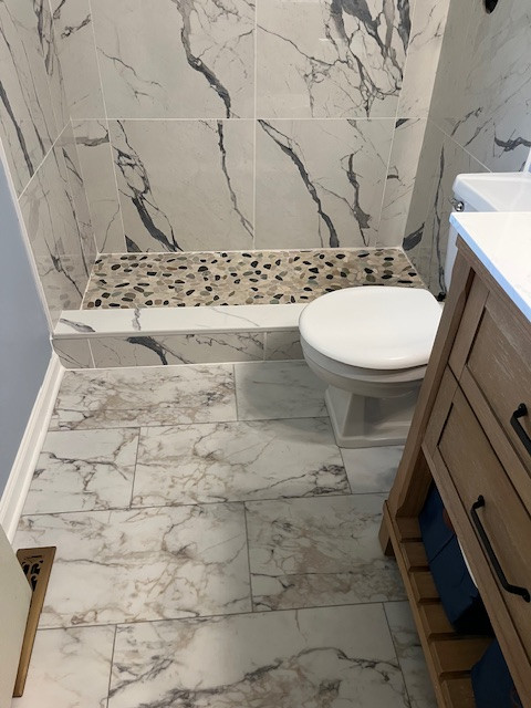 Bathroom with full tile shower