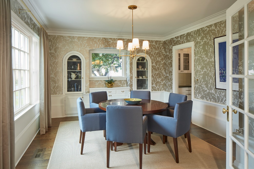 Photo of a large traditional separate dining room in Portland with multi-coloured walls, medium hardwood floors, no fireplace and brown floor.
