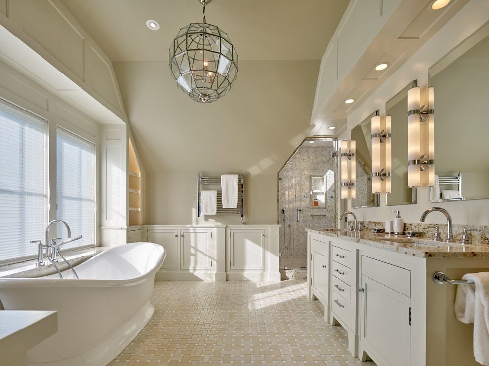 Mid-sized beach style master bathroom in Other with beige cabinets, a freestanding tub, an alcove shower, beige walls, an undermount sink, beige floor, a hinged shower door, a two-piece toilet, ceramic floors, granite benchtops, multi-coloured benchtops, beige tile and mosaic tile.