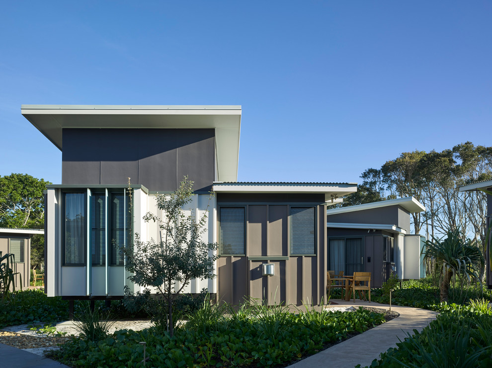 This is an example of a beach style home design in Brisbane.