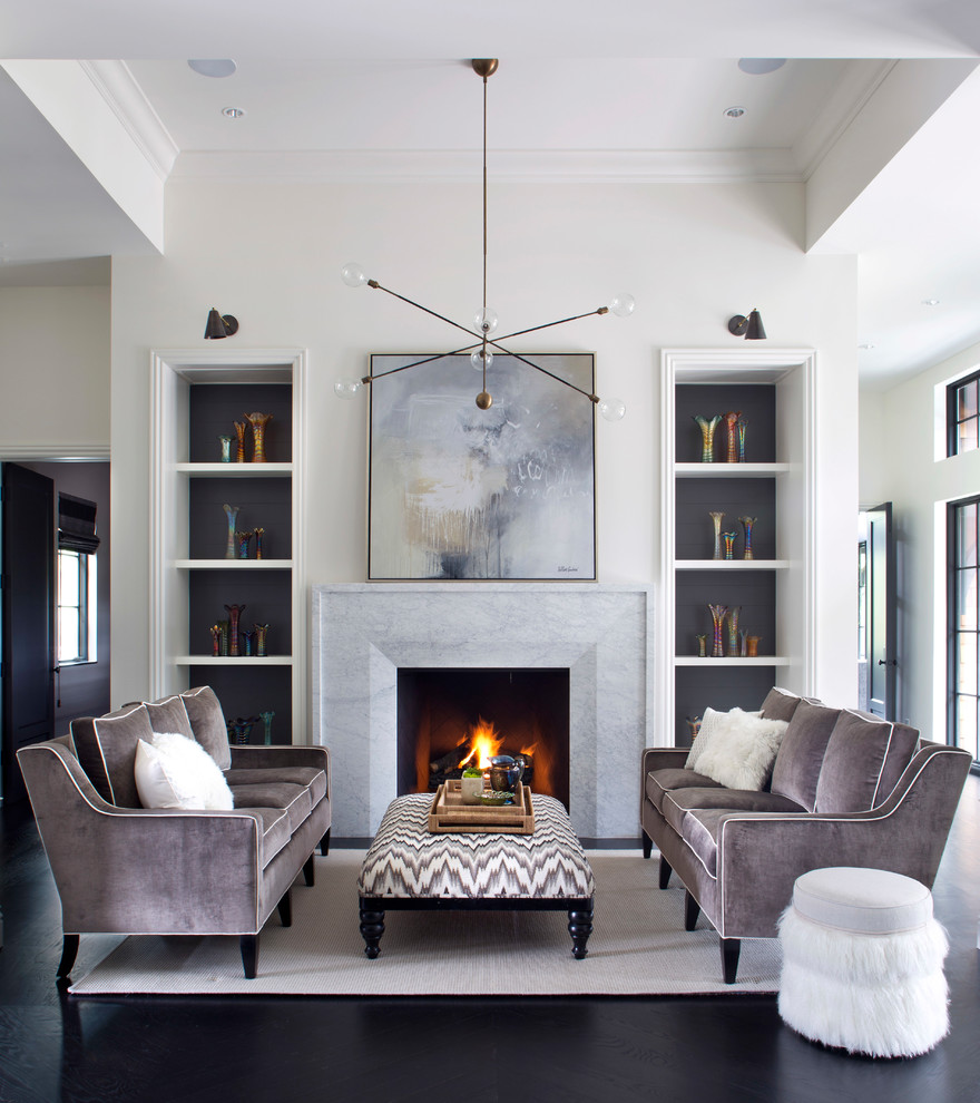 Design ideas for a transitional living room in Denver with white walls, dark hardwood floors, a standard fireplace, a stone fireplace surround and black floor.
