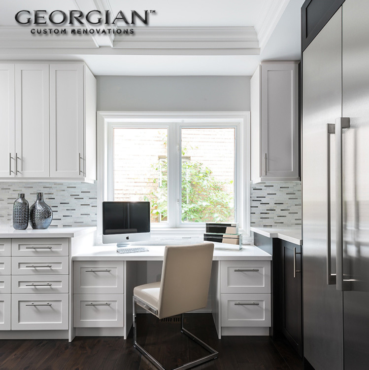Example of a mid-sized transitional l-shaped dark wood floor eat-in kitchen design in Toronto with a single-bowl sink, shaker cabinets, white cabinets, multicolored backsplash, matchstick tile backsplash, stainless steel appliances and an island
