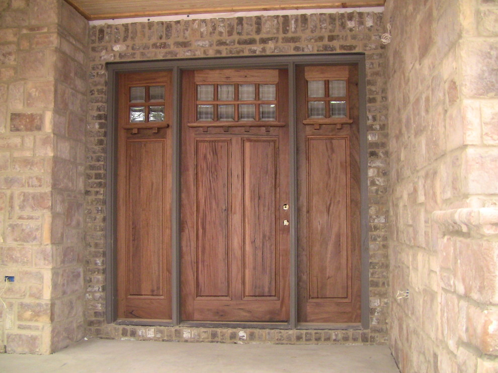 Traditional entryway in Other with a single front door.