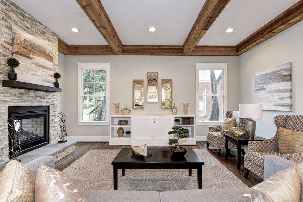 Photo of a large arts and crafts enclosed family room in DC Metro with grey walls, dark hardwood floors, a two-sided fireplace and a stone fireplace surround.
