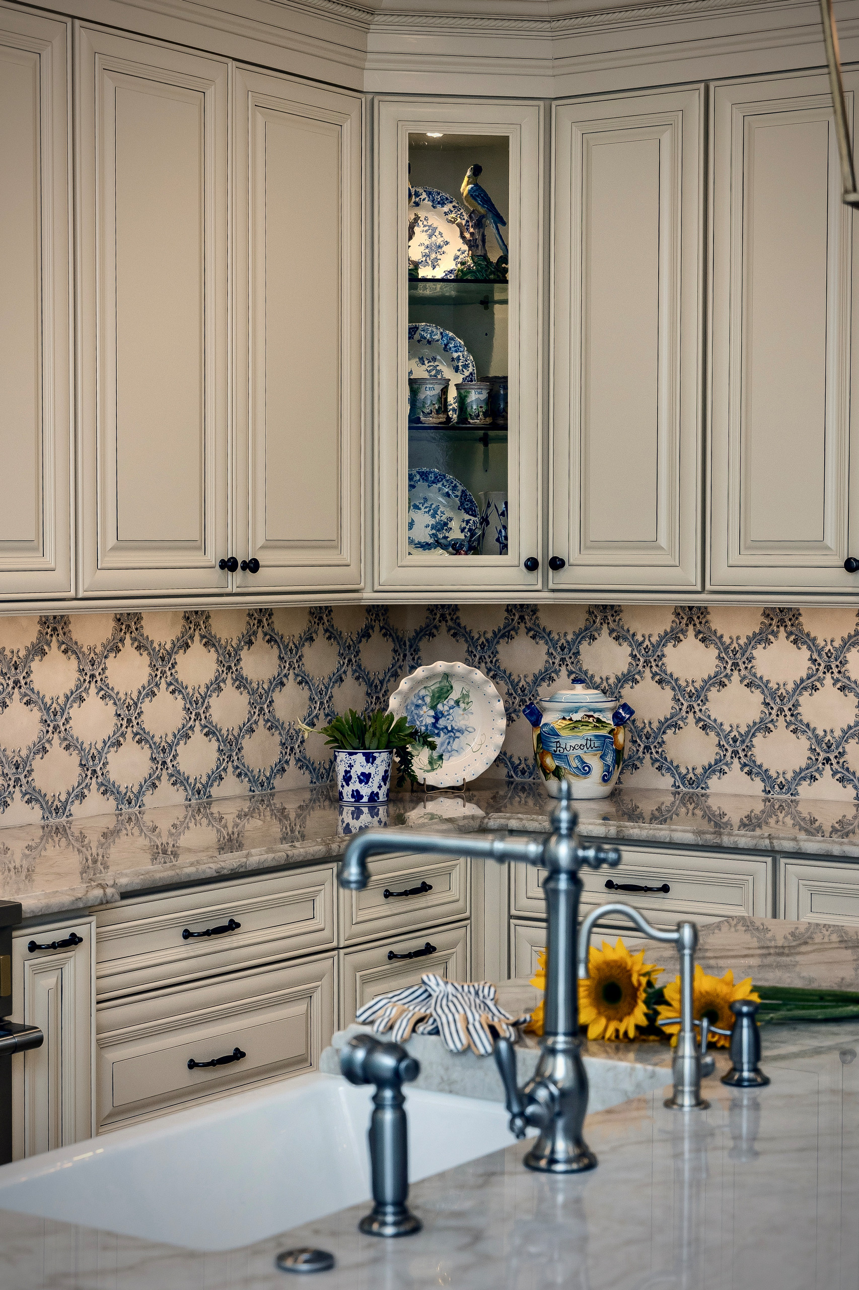 Creamy Yellow Paneled Cabinets & Handmade Tile Backsplash