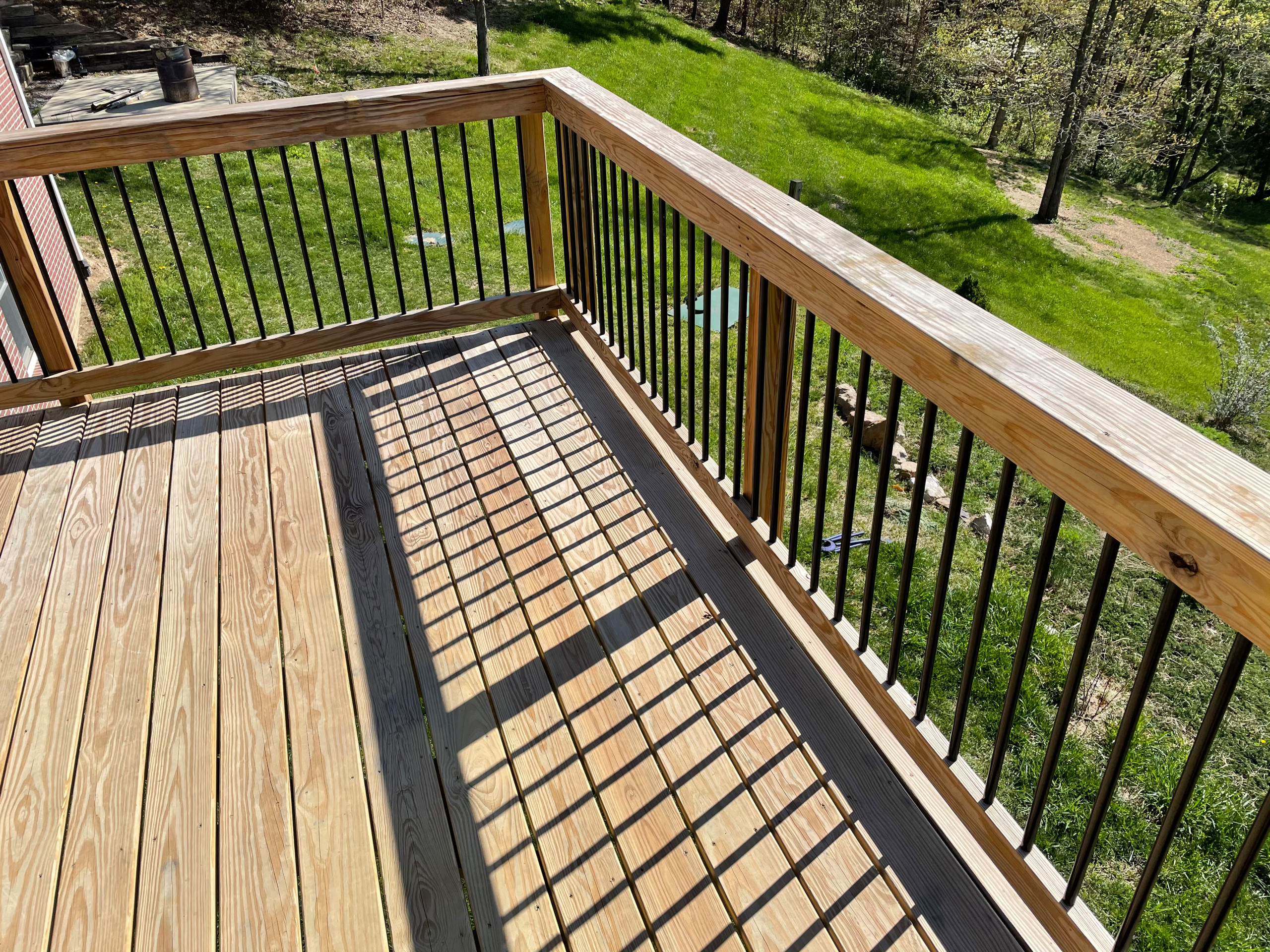 Deck stain and gutters powerwash