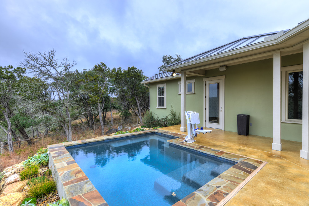 Transitional pool photo in Austin