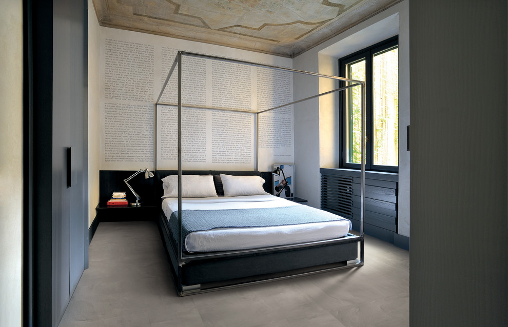 This is an example of a large contemporary guest bedroom in Other with white walls, ceramic floors and no fireplace.