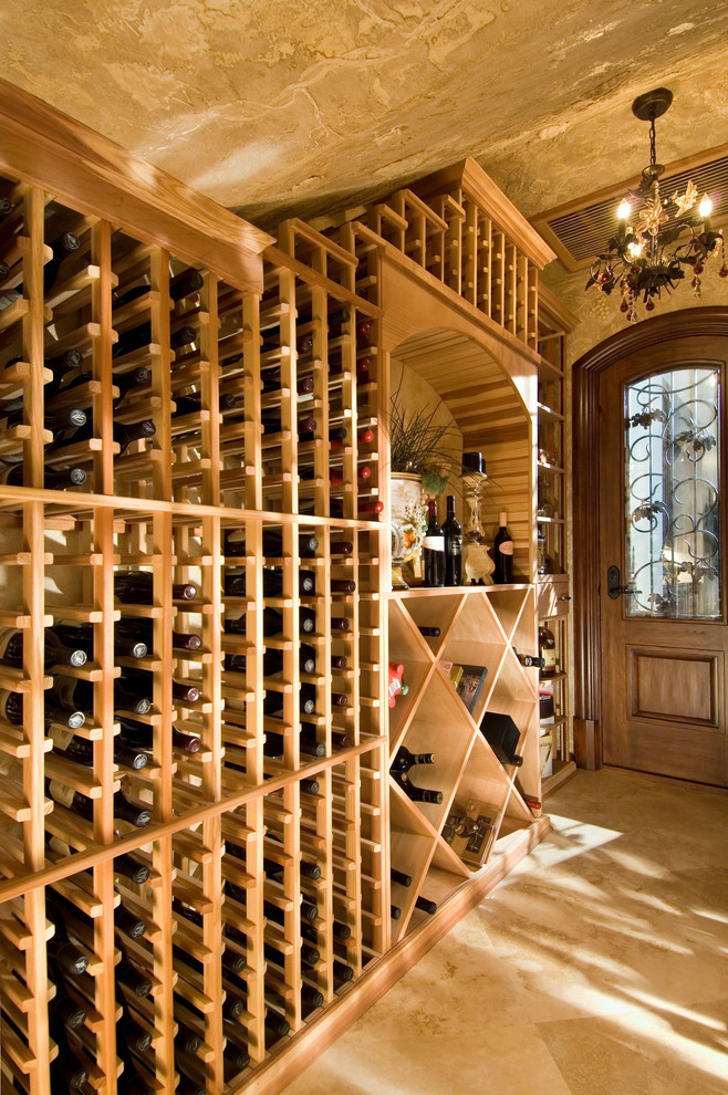 Photo of a tropical wine cellar in Miami with storage racks.