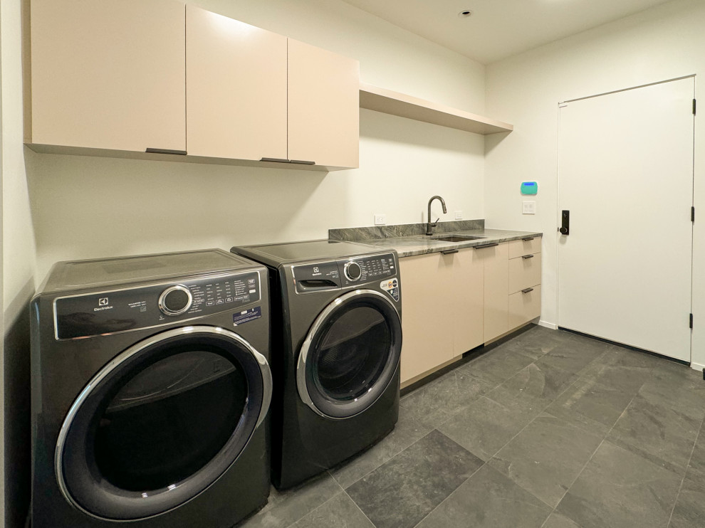 Inspiration for a modern utility room in Portland.