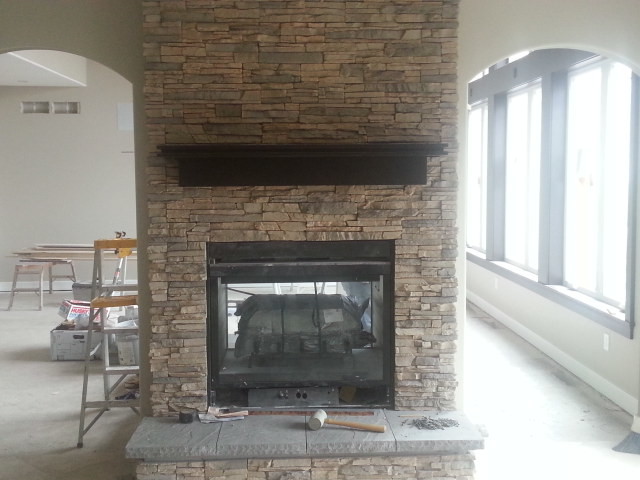 Stone see through fireplace