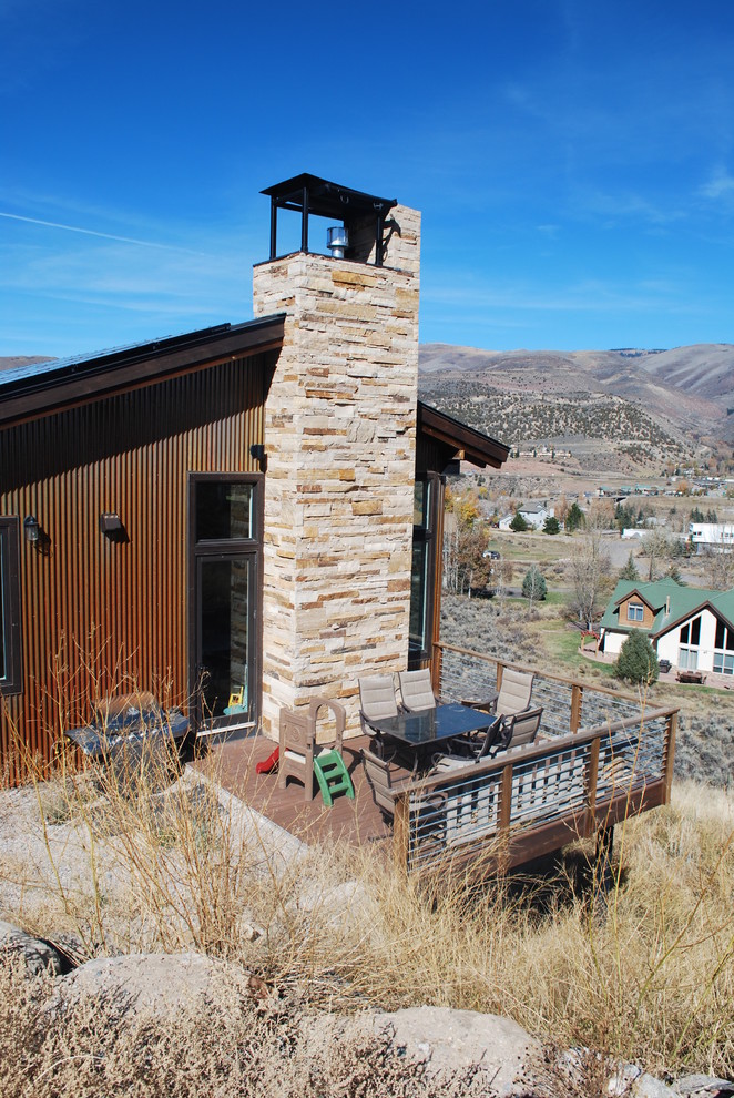 Mid-sized transitional side yard deck photo in Denver with no cover