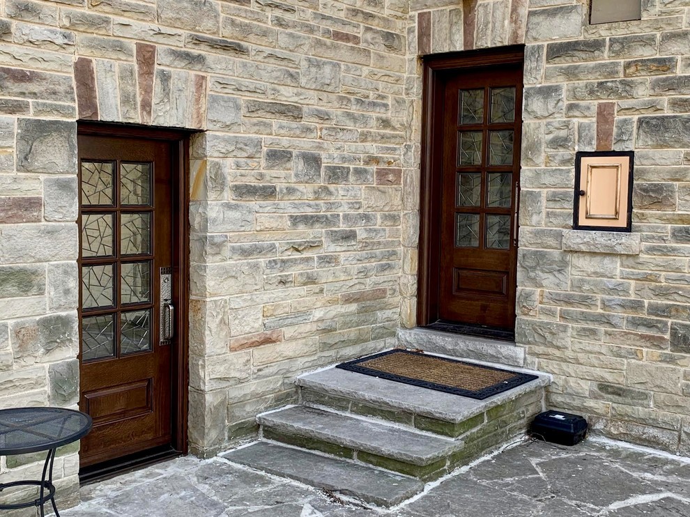 Mountain style entryway photo in Toronto