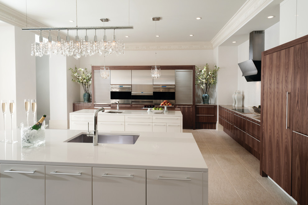 Design ideas for a large contemporary l-shaped eat-in kitchen in Houston with a single-bowl sink, flat-panel cabinets, brown cabinets, quartz benchtops, white splashback, porcelain splashback, stainless steel appliances, porcelain floors, multiple islands and grey floor.