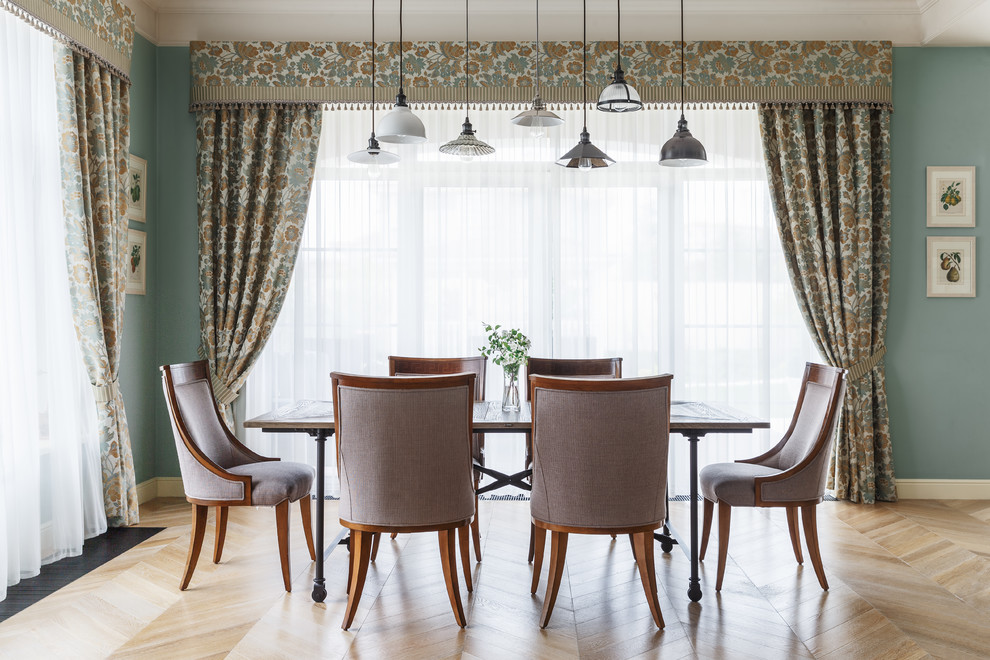 Photo of a transitional open plan dining in Other with light hardwood floors and beige floor.