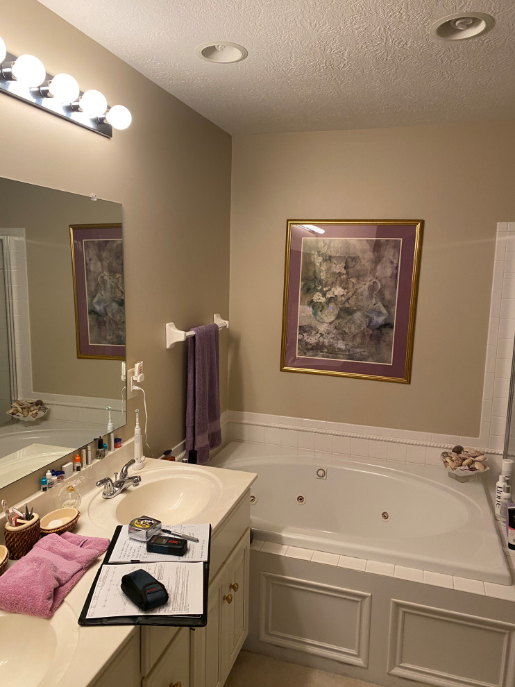 Mid-sized elegant master bathroom photo in Columbus with a built-in vanity