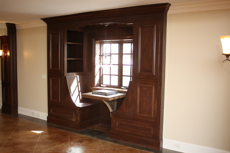 Inspiration for a large transitional look-out ceramic tile basement remodel in Chicago with beige walls