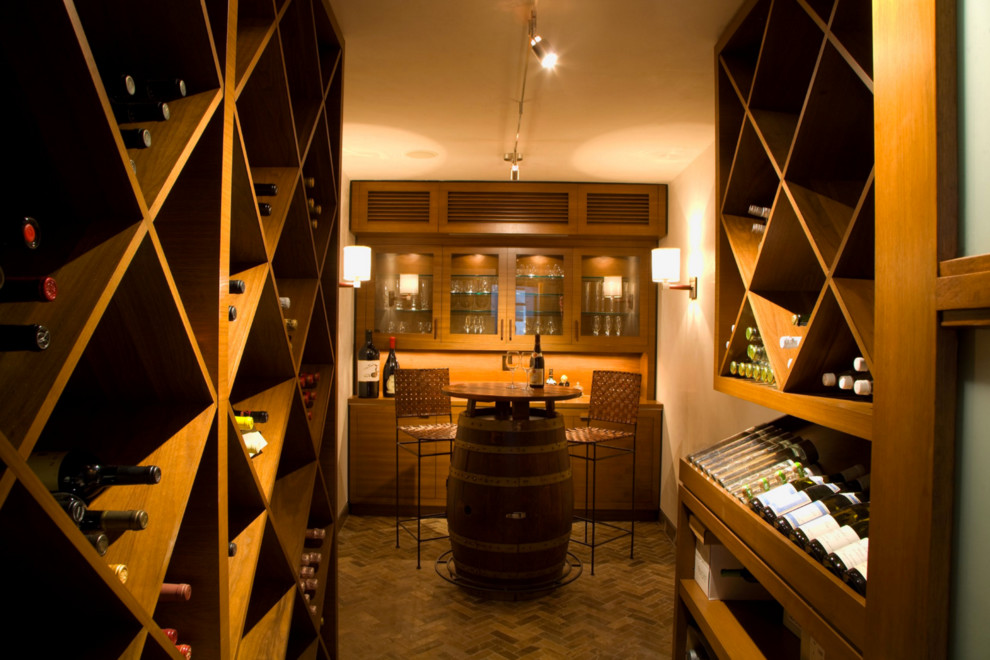 Photo of a large contemporary wine cellar in Other with display racks.