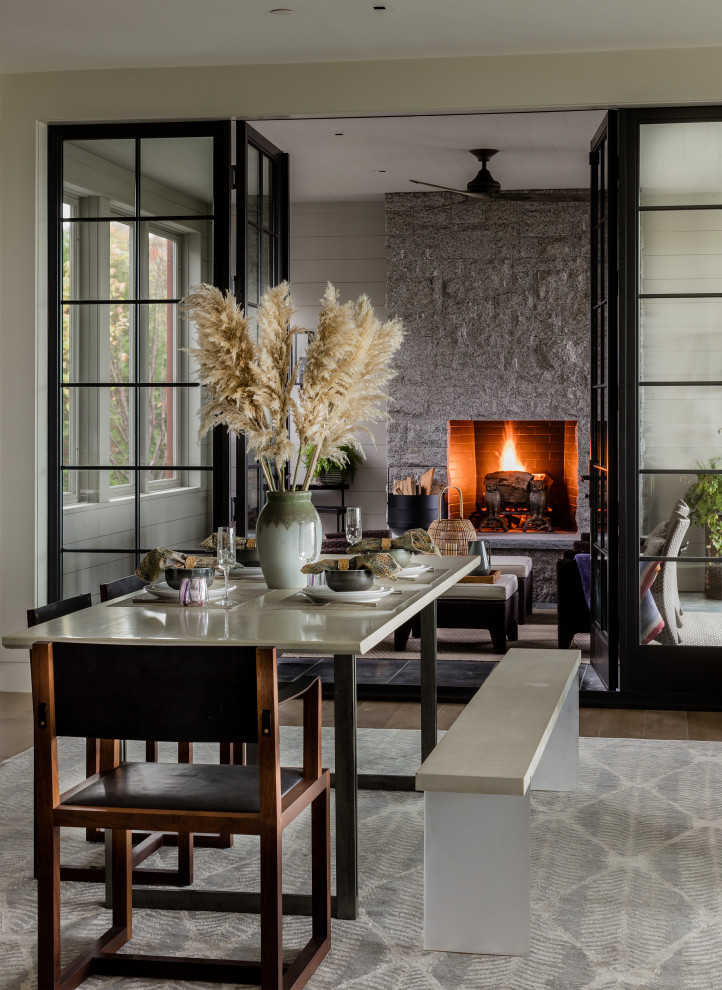Inspiration for a transitional medium tone wood floor and brown floor enclosed dining room remodel in Boston with white walls and no fireplace