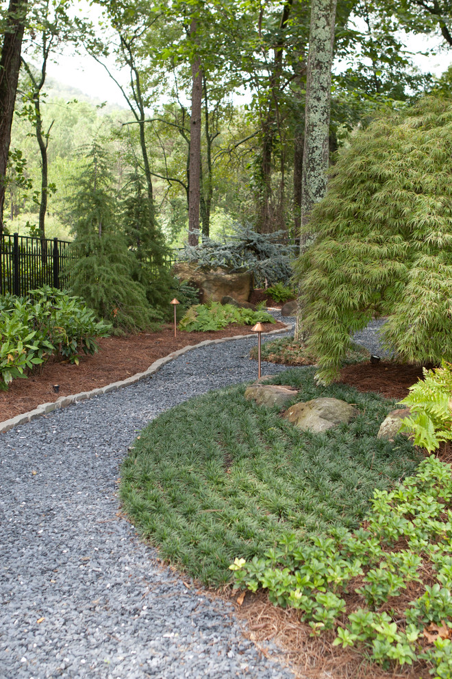 Photo of a mid-sized asian backyard partial sun formal garden in Atlanta with a garden path and gravel.