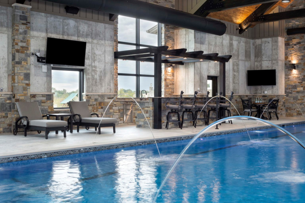 Inspiration for a rustic pool remodel in Minneapolis