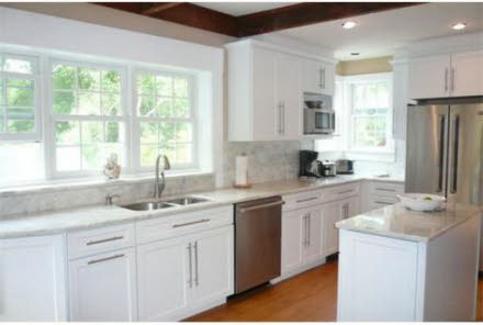 White kitchen After Renovations Traditional Kitchen 