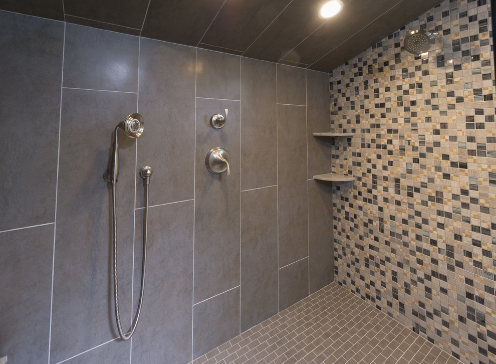 Design ideas for a mid-sized modern master bathroom in Providence with flat-panel cabinets, light wood cabinets, engineered quartz benchtops, gray tile, porcelain tile, an open shower, a two-piece toilet, an undermount sink, blue walls and porcelain floors.