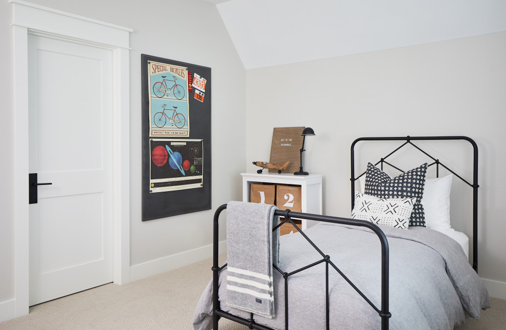 This is an example of a mid-sized country kids' room in Grand Rapids with white walls, carpet and beige floor.